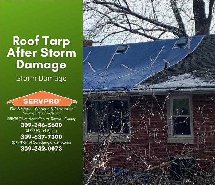 Tarped roof after storm damage.