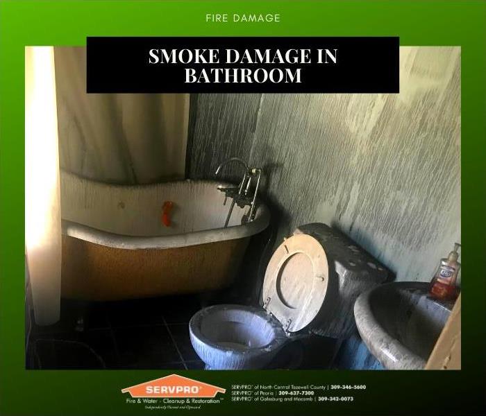 Smoke and soot damage completely covering a bathroom - from top to bottom.