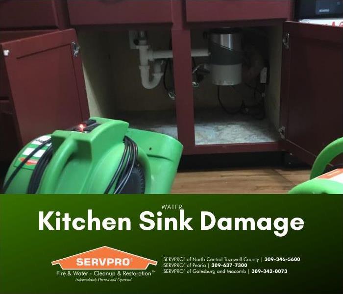 Air movers drying area under a sink