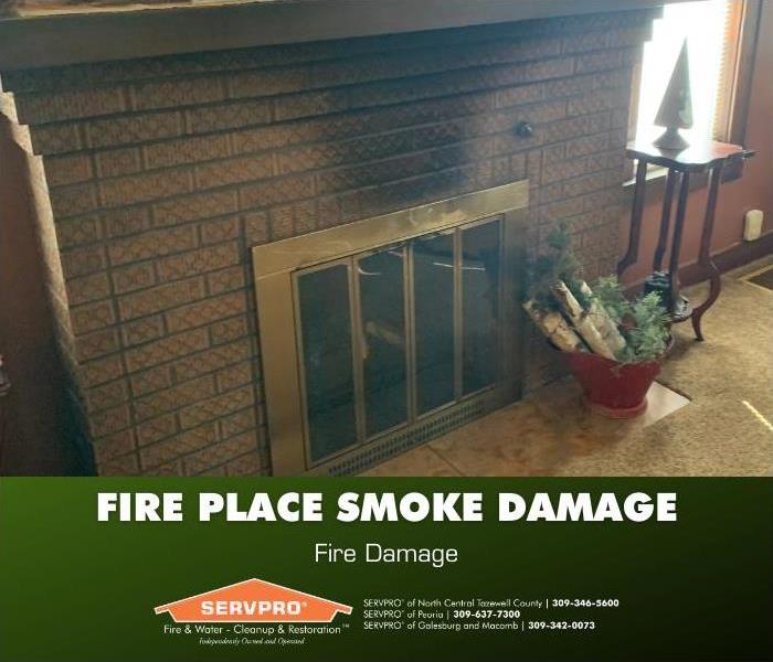 Smoke damage to the bricks above the fireplace in a living room.