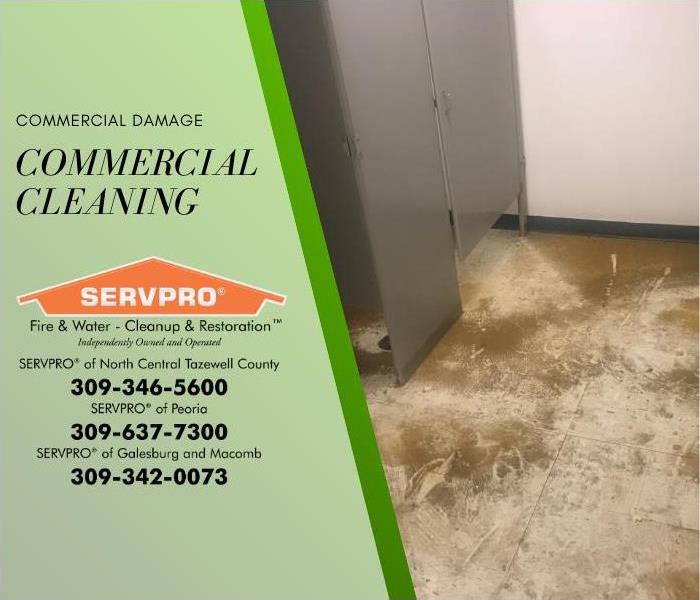Image of commercial building bathroom with the floor covered in dirt and grime.